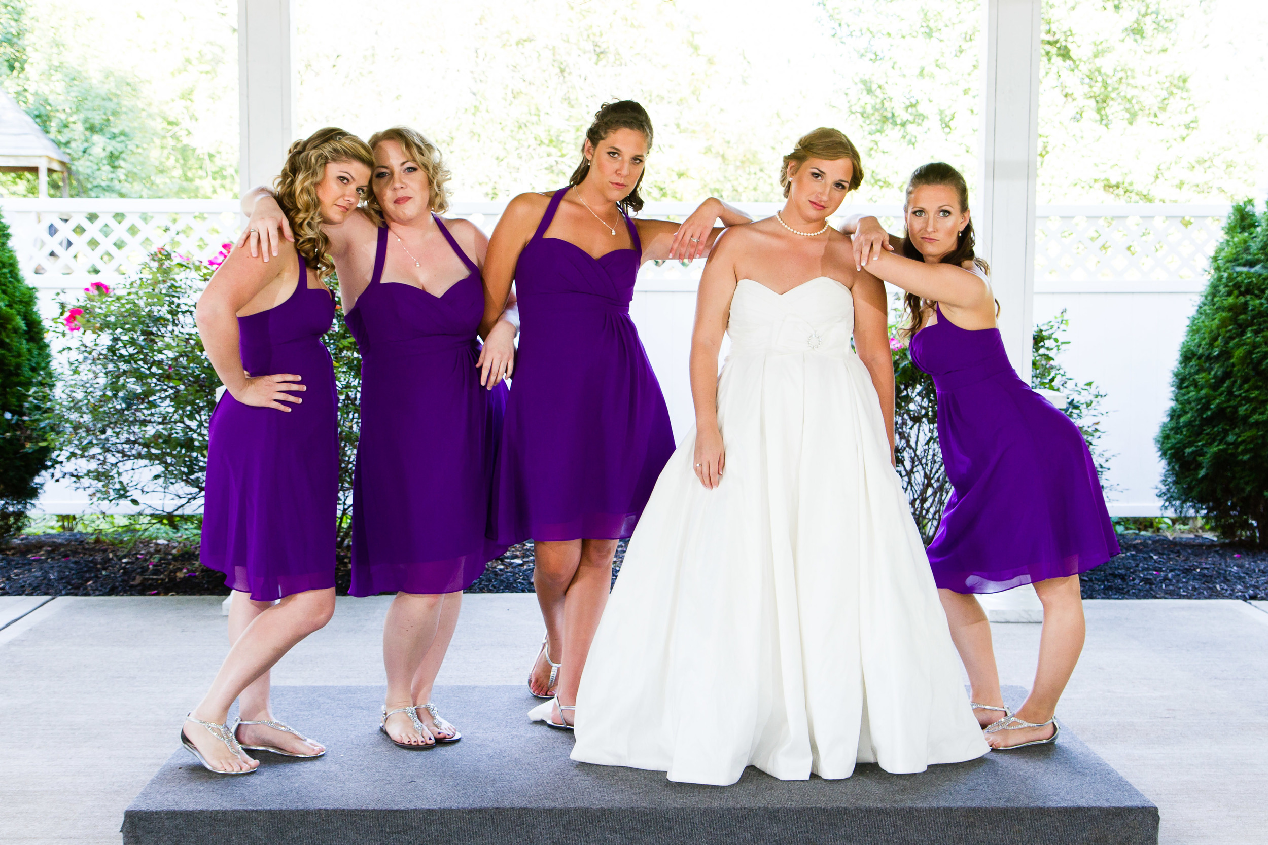 Wedding photograph of a bride with bridesmaids 